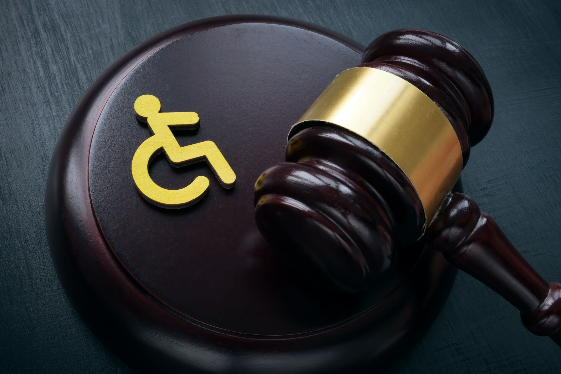 disabled person sign gavel accessibility law