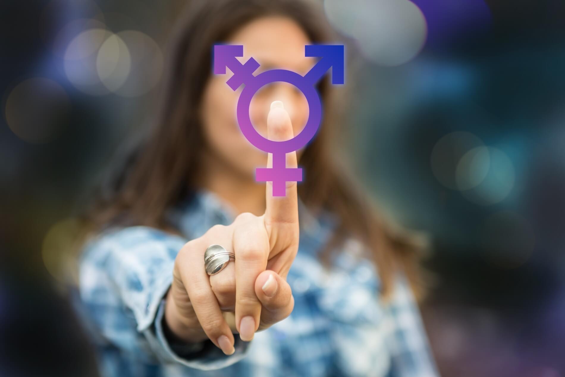 person pressing transgender symbol on touch