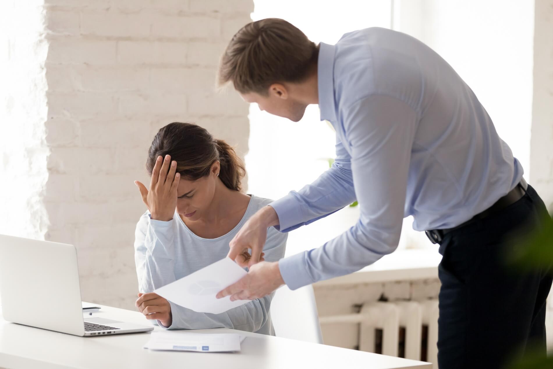 stressed woman gets scolding boss people